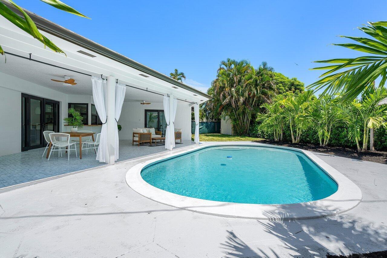 1200 Southwest 8th Street Boca Raton, FL 33486 - Photo 29 of 42 a view of outdoor space yard swimming pool and patio