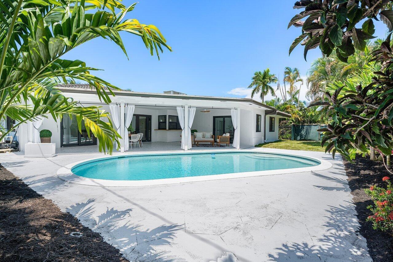 1200 Southwest 8th Street Boca Raton, FL 33486 - Photo 30 of 42 a view of outdoor space yard and swimming pool