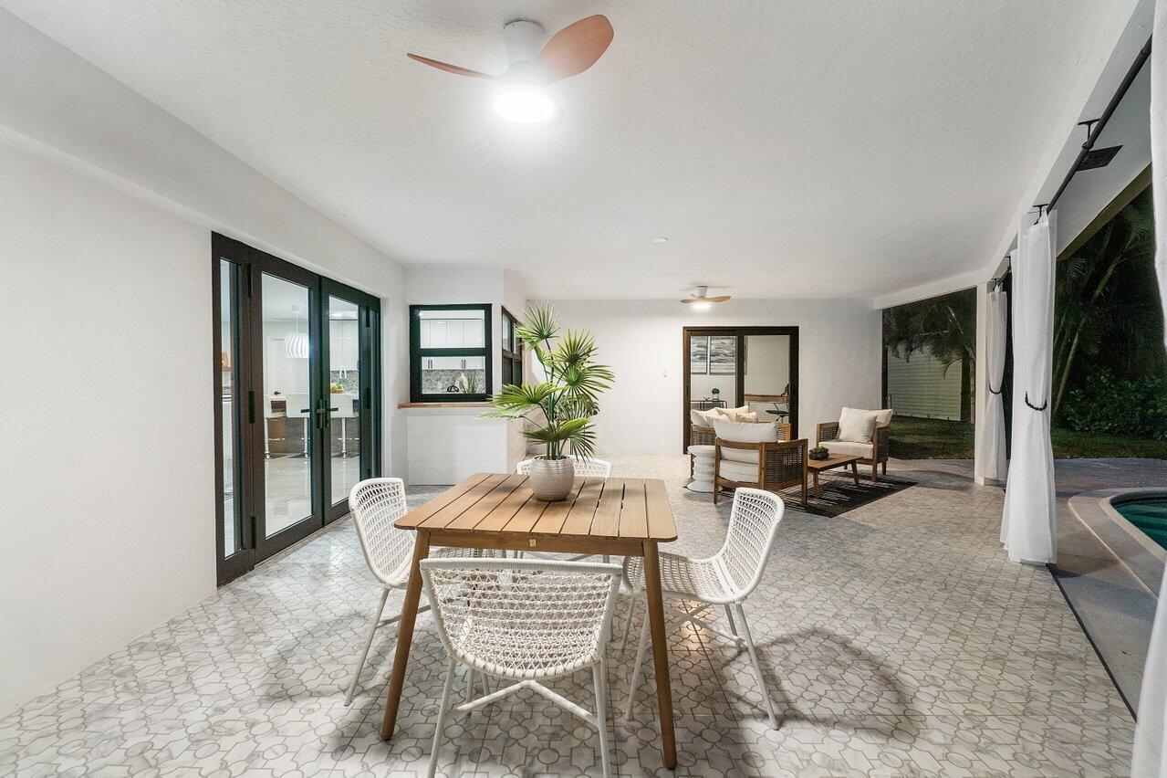 1200 Southwest 8th Street Boca Raton, FL 33486 - Photo 41 of 42 a dining room with furniture and window
