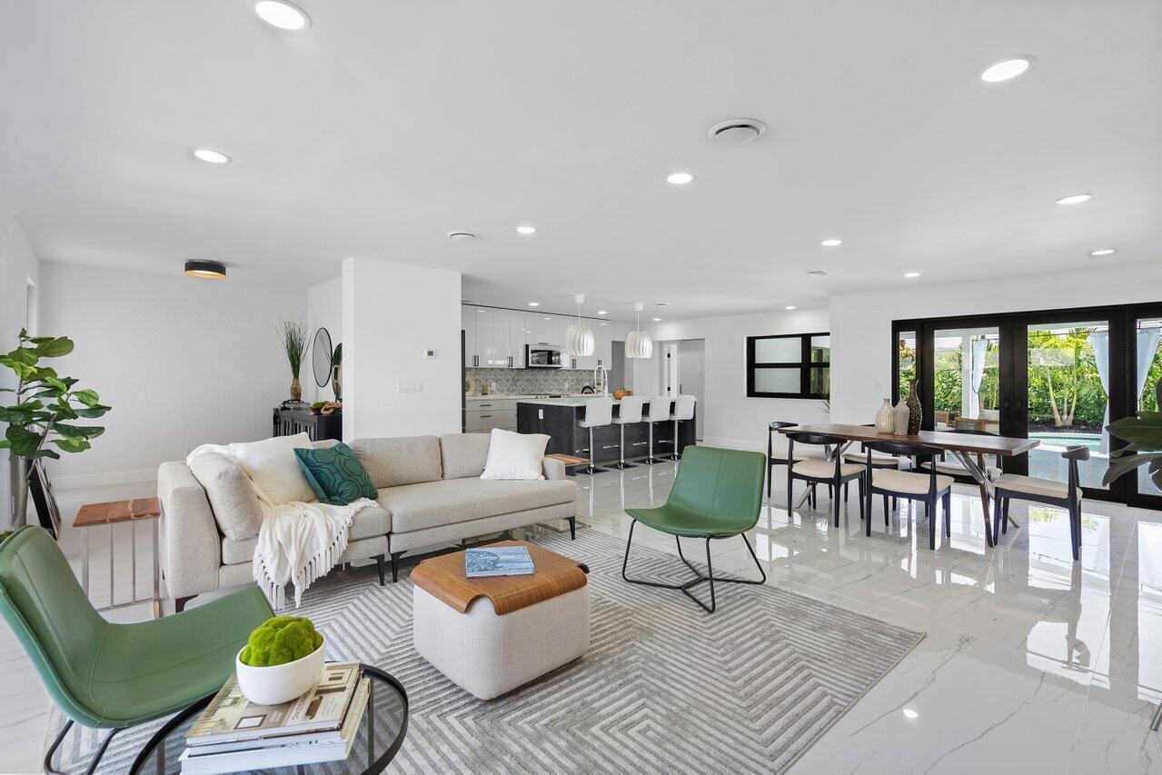 1200 Southwest 8th Street Boca Raton, FL 33486 - Photo 7 of 42 a living room with furniture and a table