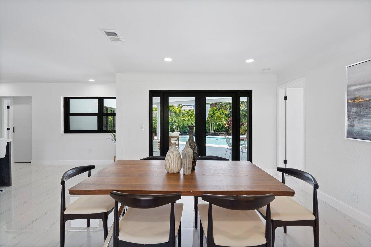 1200 Southwest 8th Street Boca Raton, FL 33486 - Photo 8 of 42 a view of a dining room with furniture