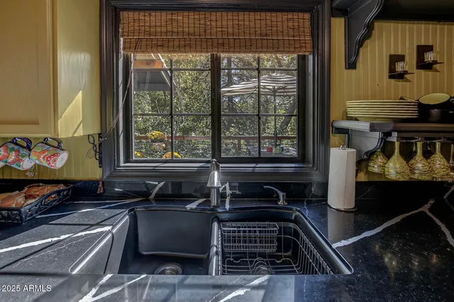 a kitchen with a stove and a cabinet