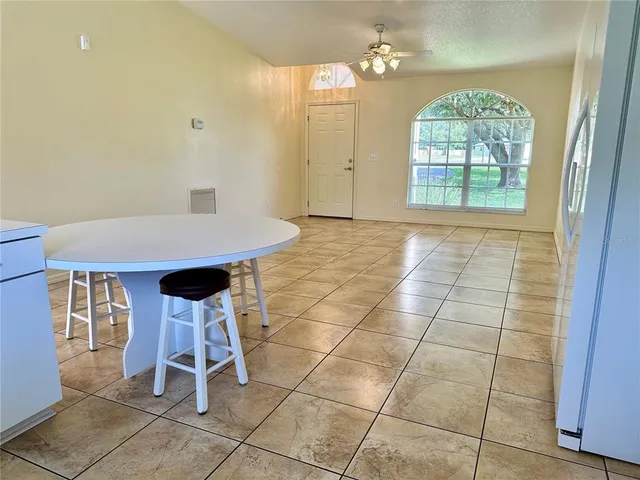 a view of a livingroom with furniture and window