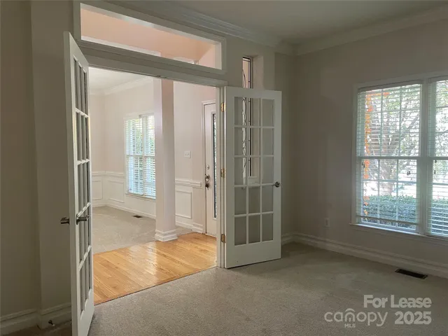 an empty room with windows