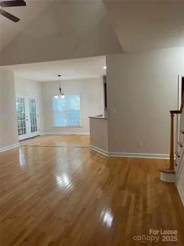 a view of a livingroom with wooden floor