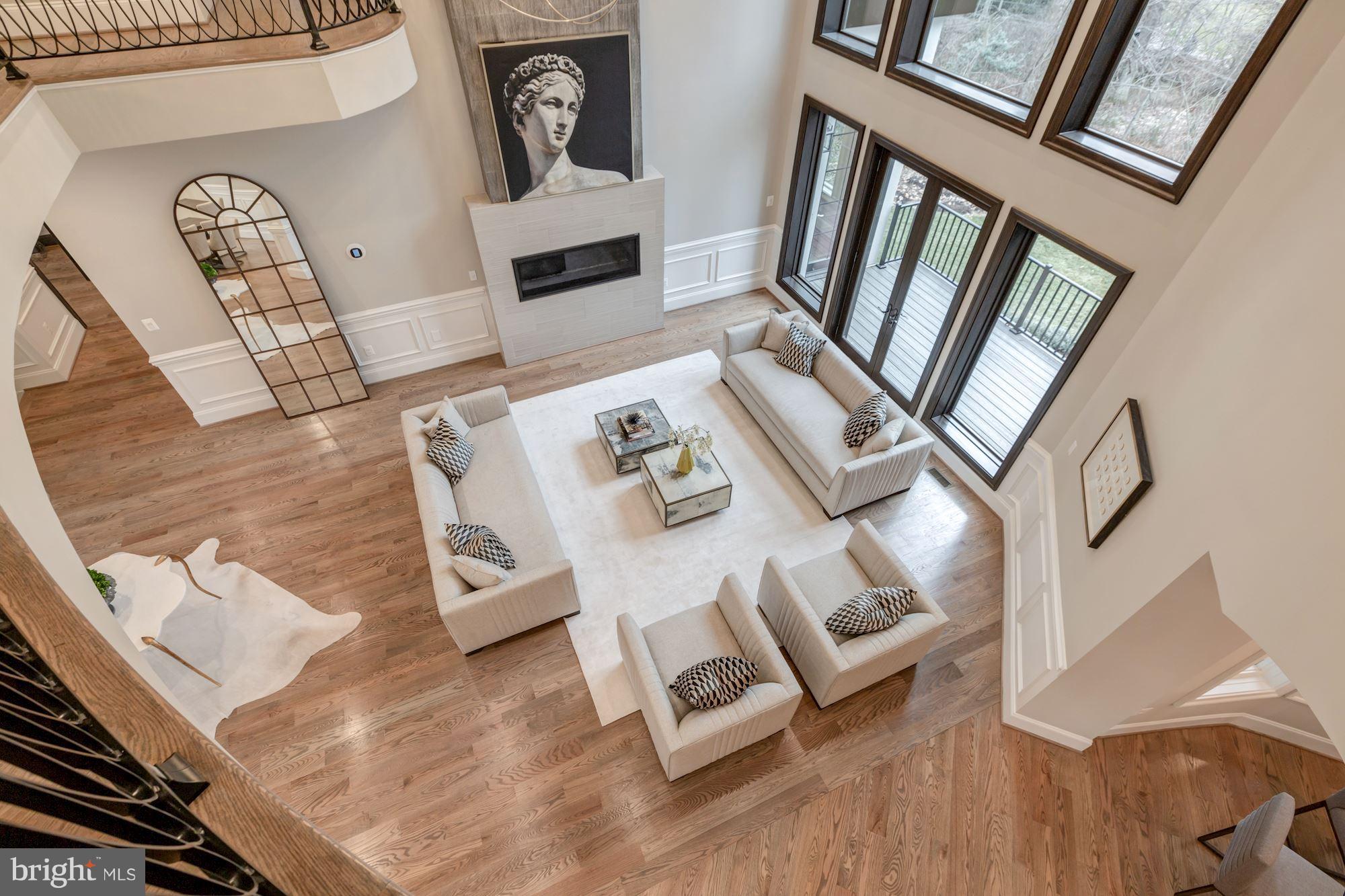 1060 Vista Drive McLean, VA 22102 - Photo 15 of 34 OPEN FOYER LOOKING DOWN INTO FAMILY ROOM