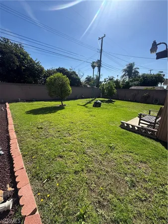 a view of a golf club with a backyard