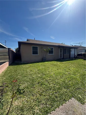 a house view with a garden space
