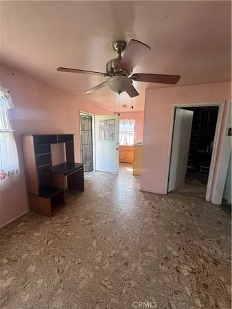 a view of a livingroom with furniture