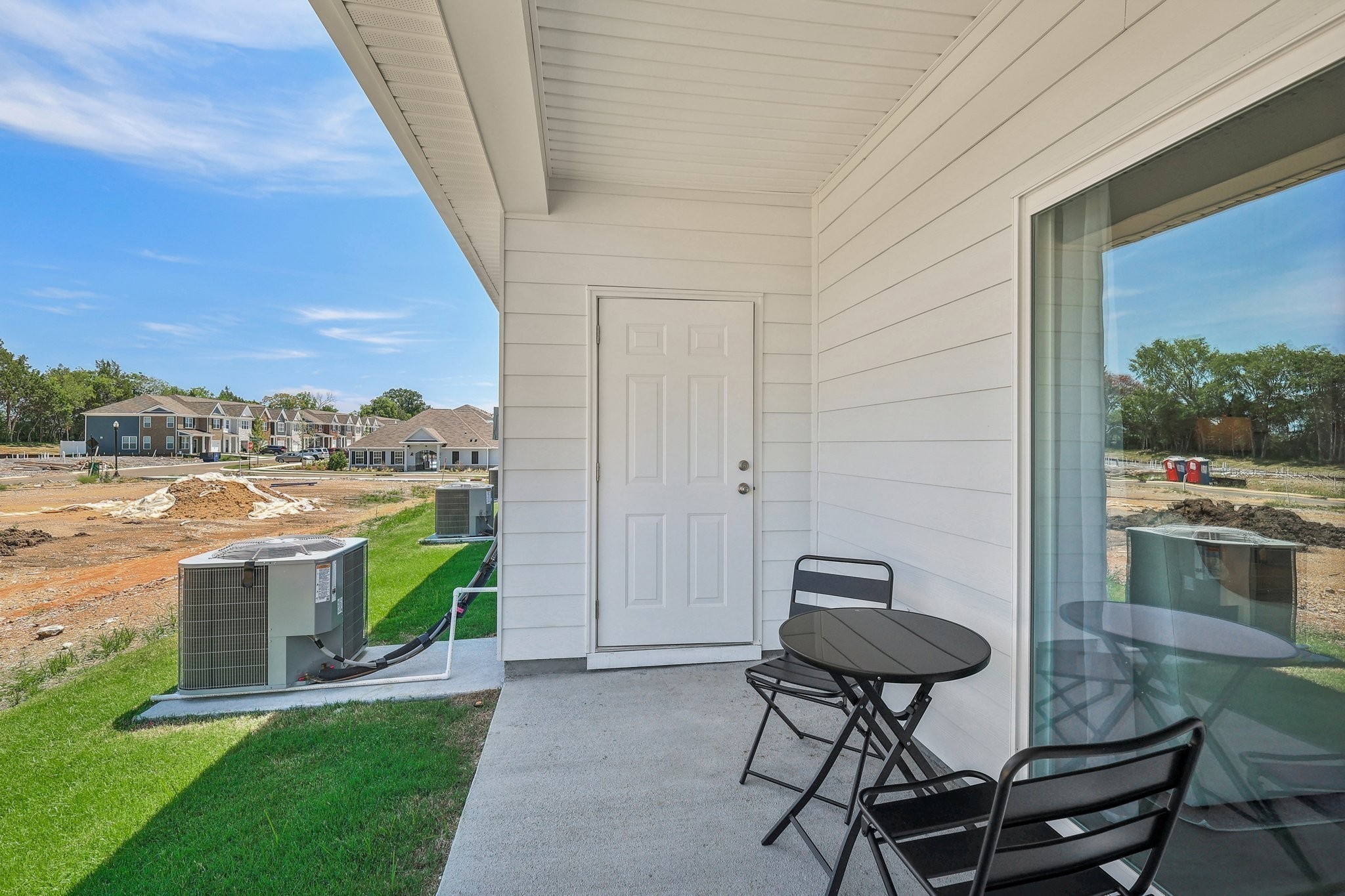 914 Highfield Way Lebanon, TN 37087 - Photo 24 of 29 a patio with table and chairs and potted plants