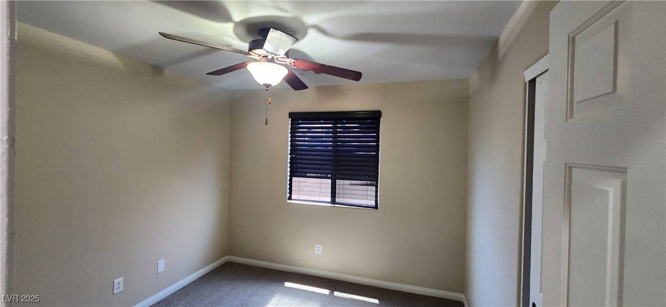 10211 Glimmering Star Drive Las Vegas, NV 89178 - Photo 17 of 33 Unfurnished room featuring ceiling fan and carpet flooring