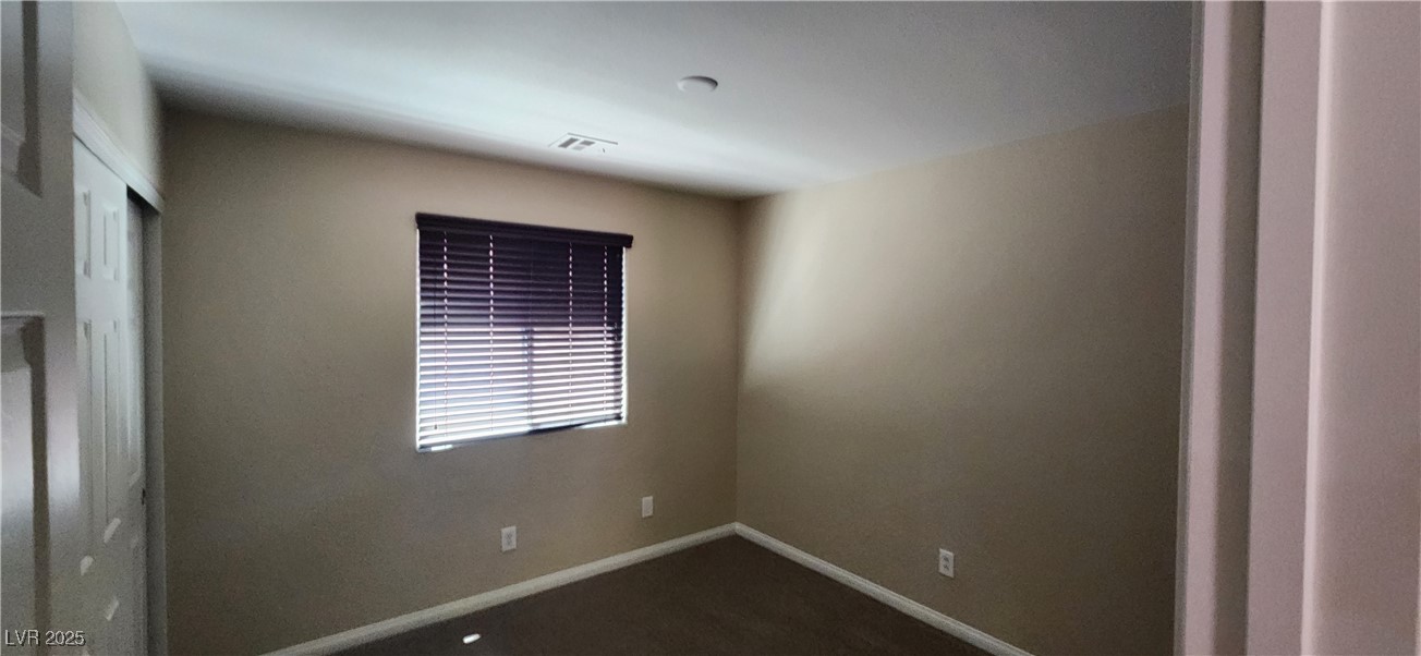 10211 Glimmering Star Drive Las Vegas, NV 89178 - Photo 18 of 33 Empty room with baseboards