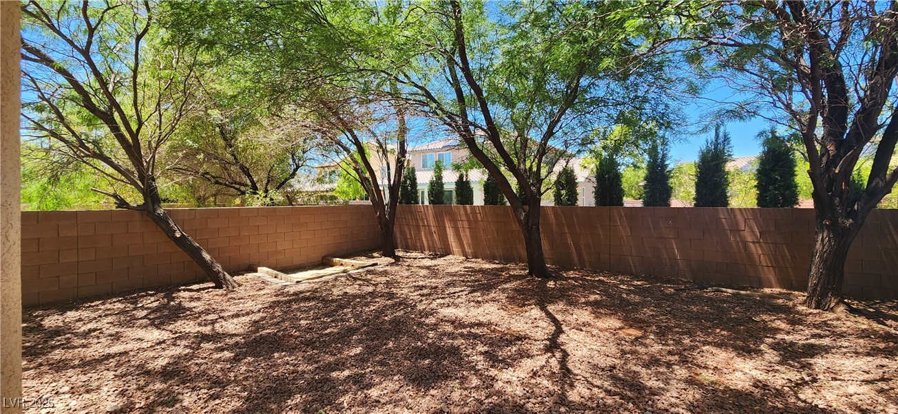 10211 Glimmering Star Drive Las Vegas, NV 89178 - Photo 22 of 33 View of fenced yard