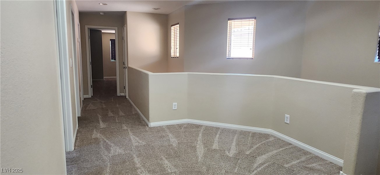 10211 Glimmering Star Drive Las Vegas, NV 89178 - Photo 9 of 33 Corridor featuring carpet flooring