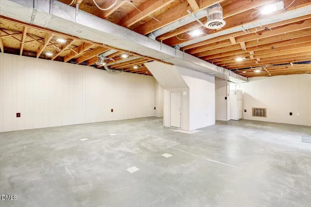 a view of a house with a snow in the yard