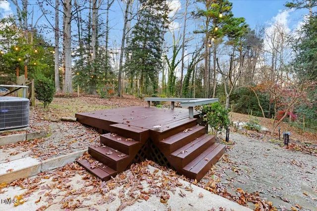 an aerial view of a house outdoor space and street view