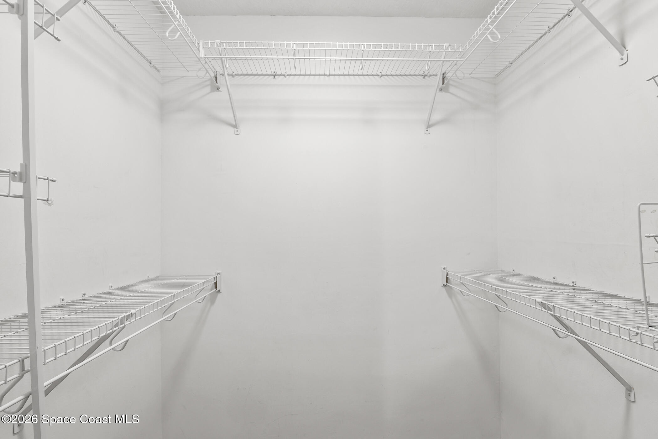 7667 North Wickham Road, Unit 1201 Melbourne, FL 32940 - Photo 13 of 29 Primary Bedroom Walk in Closet