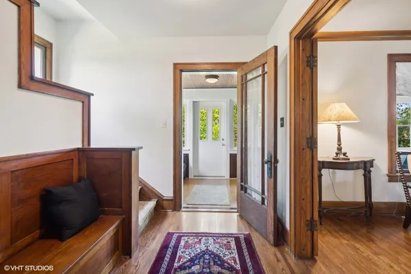 a view of bedroom with furniture and wooden floor