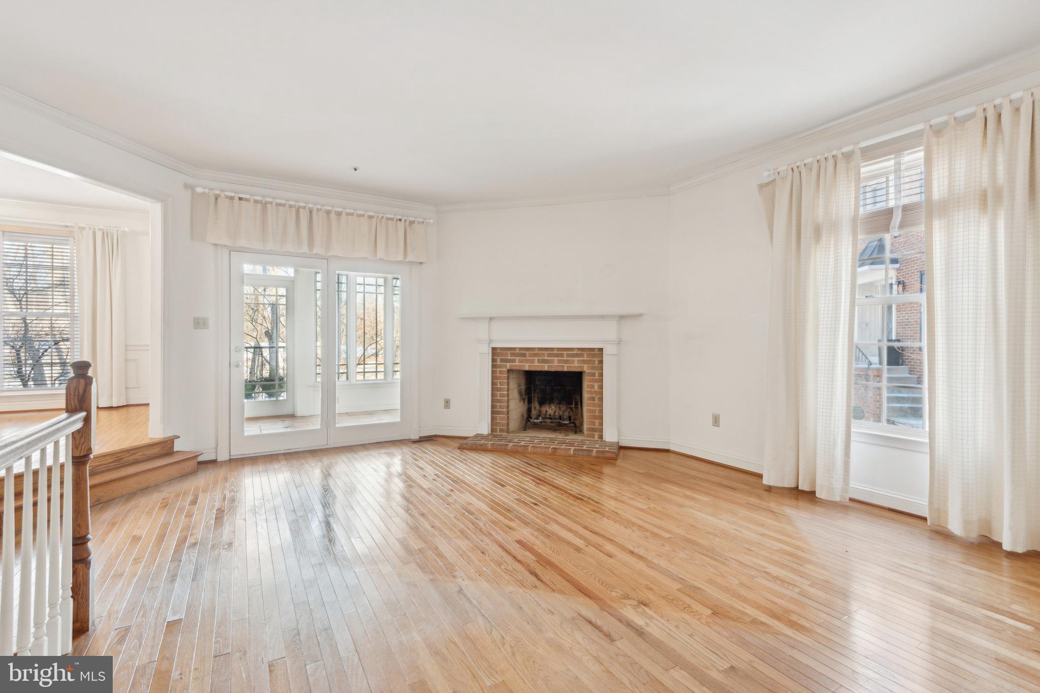 11814 Bishops Content Road Bowie, MD 20721 - Photo 11 of 40 Living Room with Woodburning Fireplace