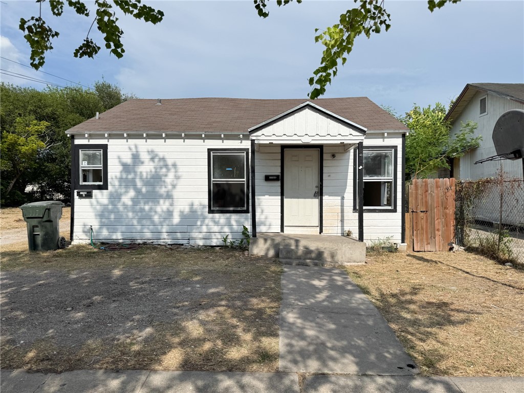 a view of a house with a garage