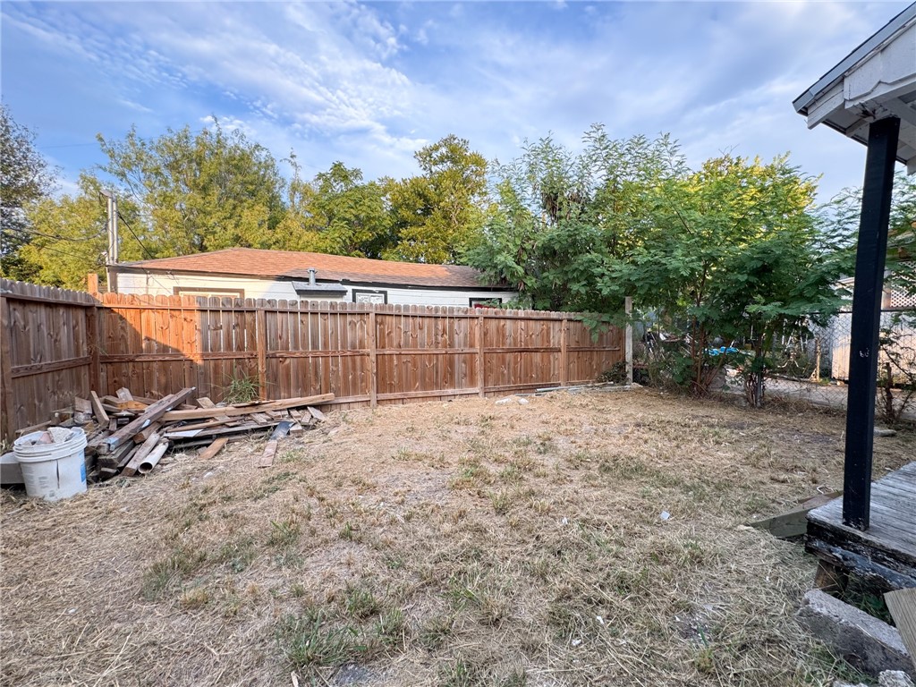 1108 14th Street Corpus Christi, TX 78404 - Photo 11 of 11 a backyard of a house with table and chairs