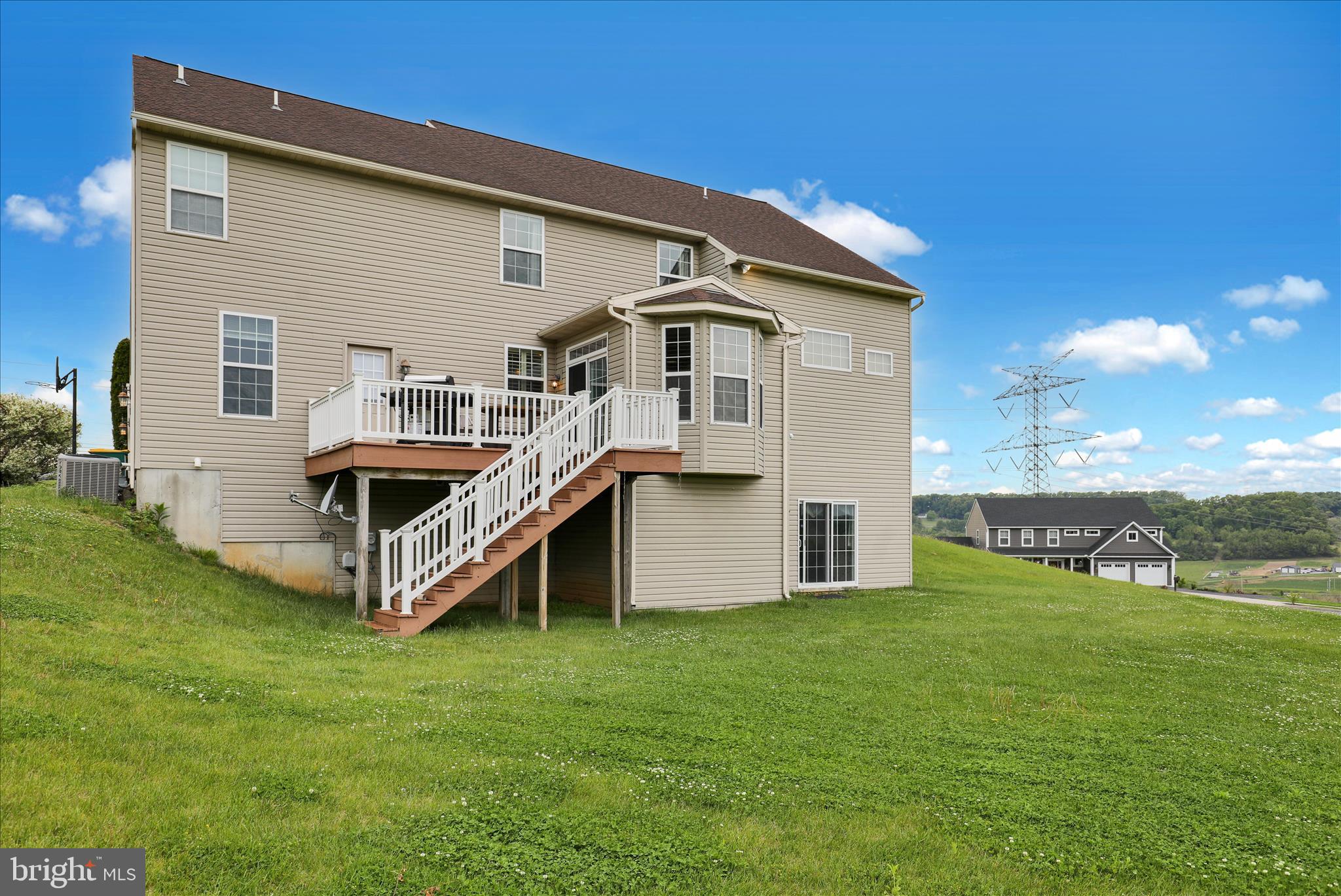 121 Great Bend Way Sinking Spring, PA 19608 - Photo 54 of 59 a white house with a big yard and more large trees