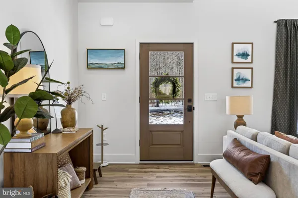 a view of a door with a tree in front of it