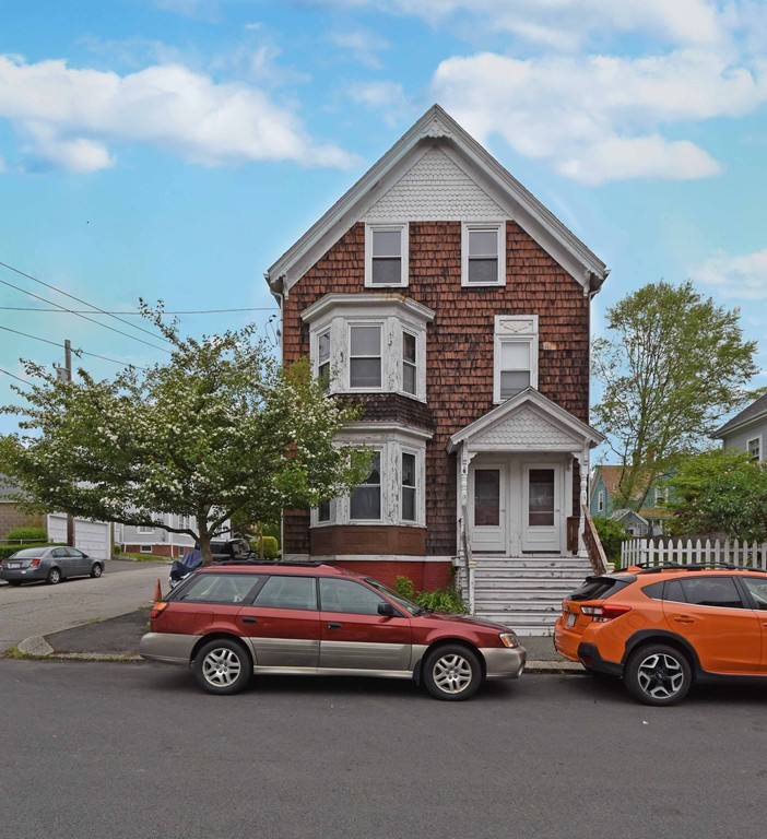 17 Willow Avenue Salem, MA 01970 - Photo 1 of 12 a front view of a house with parking space