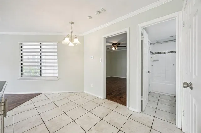a view of an empty room and window