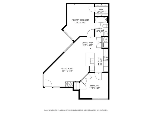 a picture of a bench in front of a wall