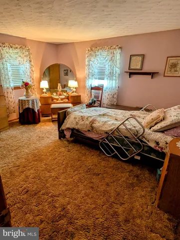 a room with furniture and a window