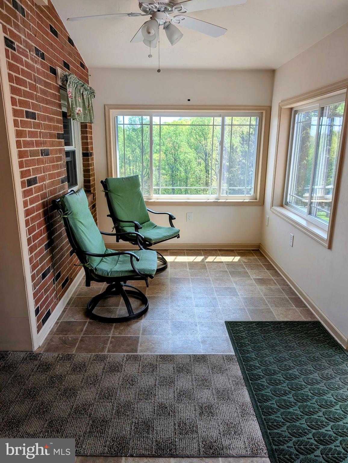 12706 High Point Road Felton, PA 17322 - Photo 6 of 56 a living room with furniture and a large window