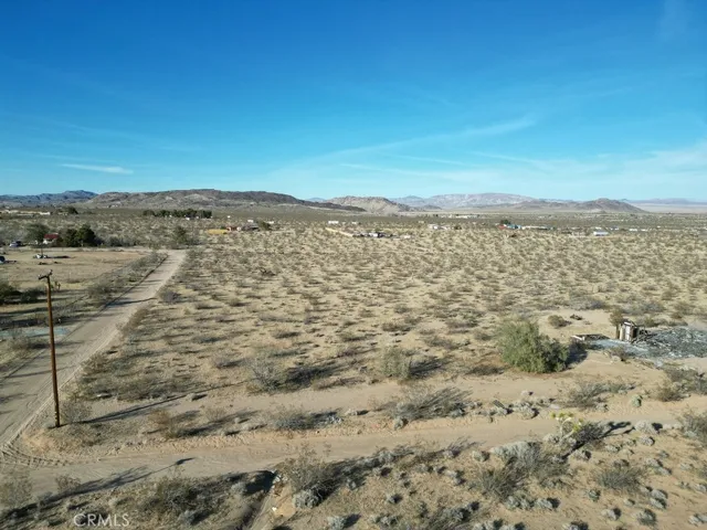 a view of a lake with mountain