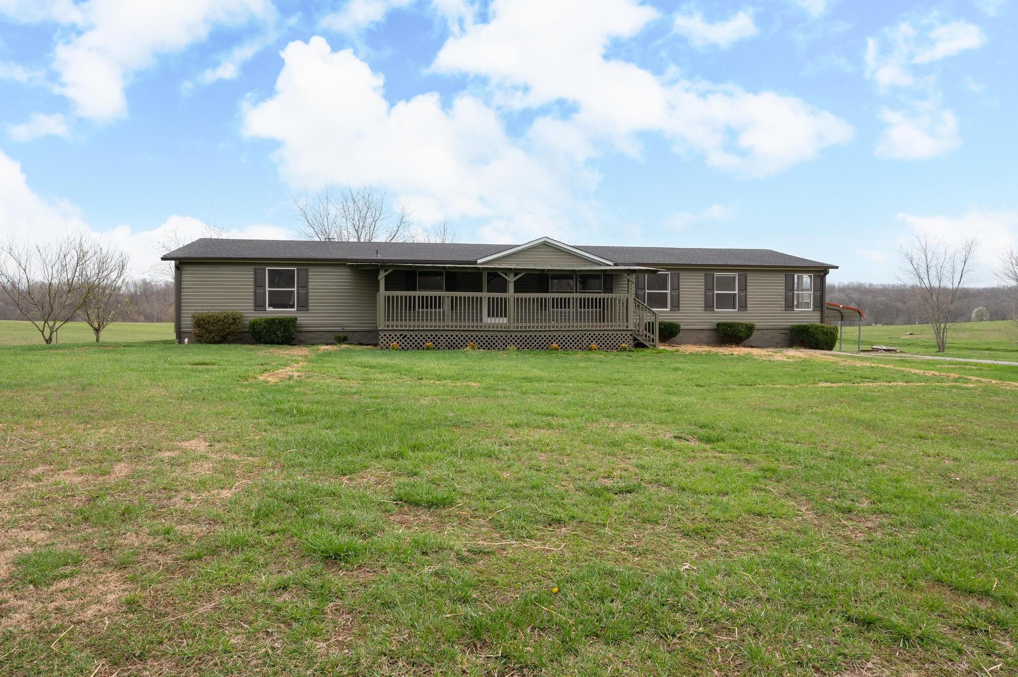 6475 North Pinson Road Portland, TN 37148 - Photo 2 of 23 a view of a house with yard and sitting area