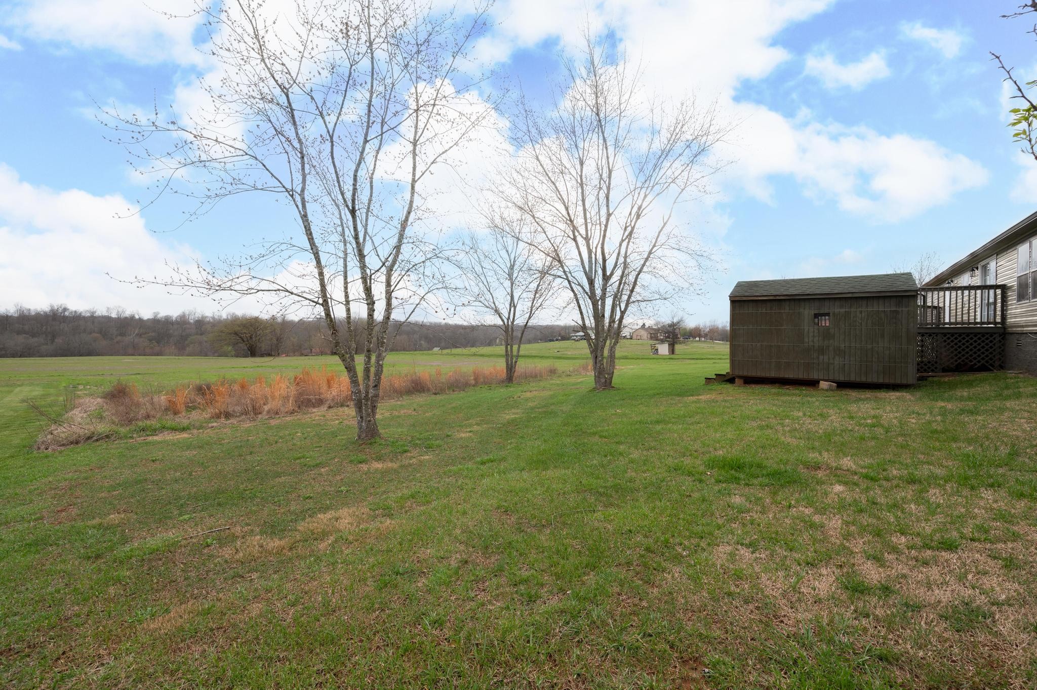 6475 North Pinson Road Portland, TN 37148 - Photo 21 of 23 a view of a garden with an outdoor space