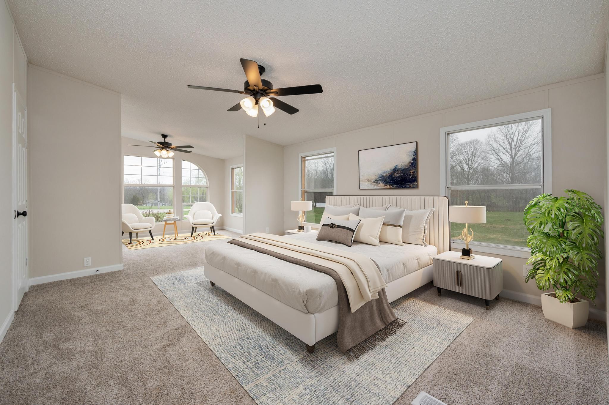 6475 North Pinson Road Portland, TN 37148 - Photo 5 of 23 a large bedroom with a large bed and a chandelier fan
