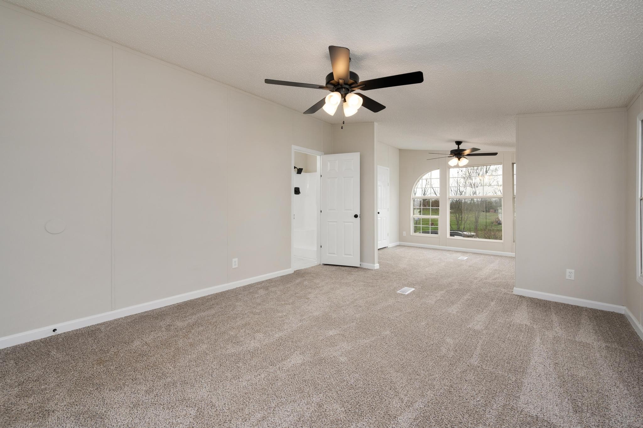 6475 North Pinson Road Portland, TN 37148 - Photo 6 of 23 a view of an empty room with a window