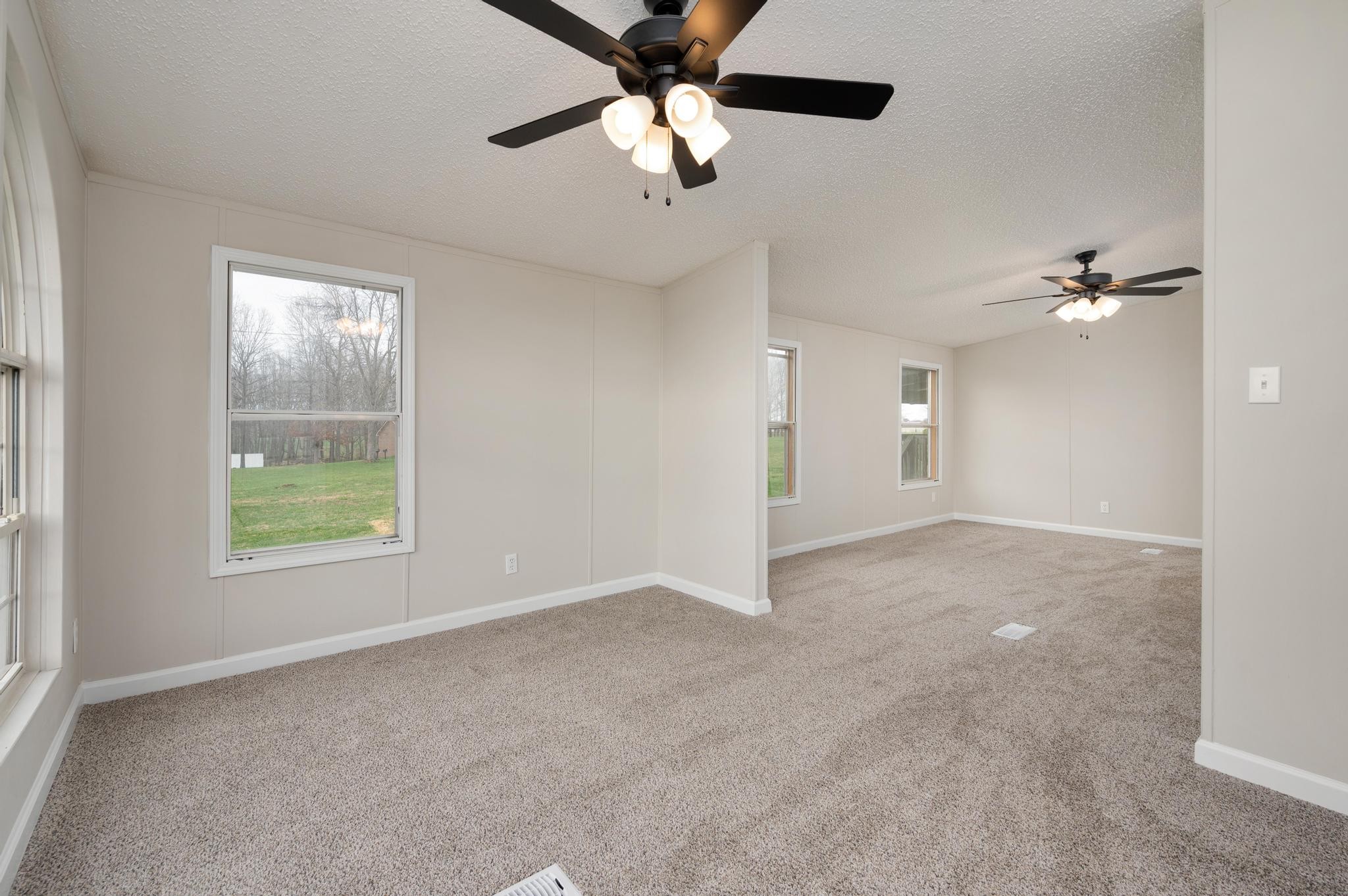 6475 North Pinson Road Portland, TN 37148 - Photo 7 of 23 a view of an empty room with a window