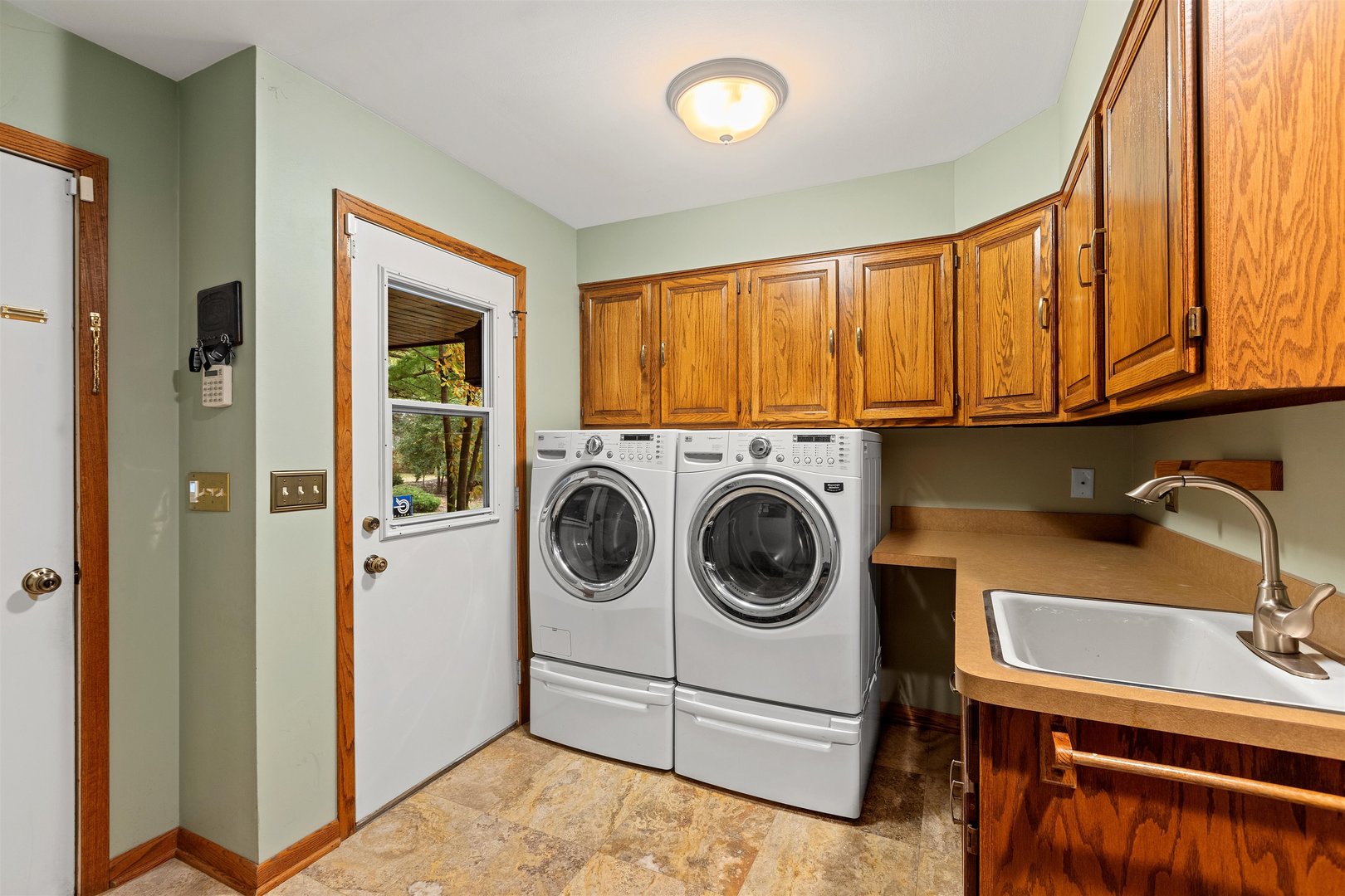 1051 Saunders Road Riverwoods, IL 60015 - Photo 12 of 37 a utility room with dryer and washer
