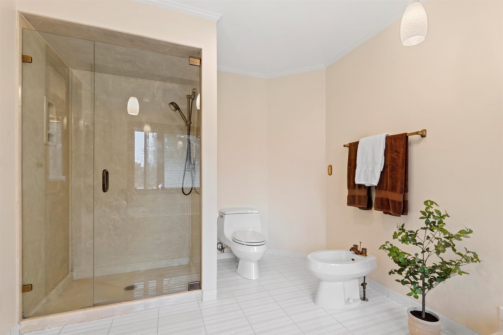1051 Saunders Road Riverwoods, IL 60015 - Photo 16 of 37 a bathroom with a toilet sink and shower