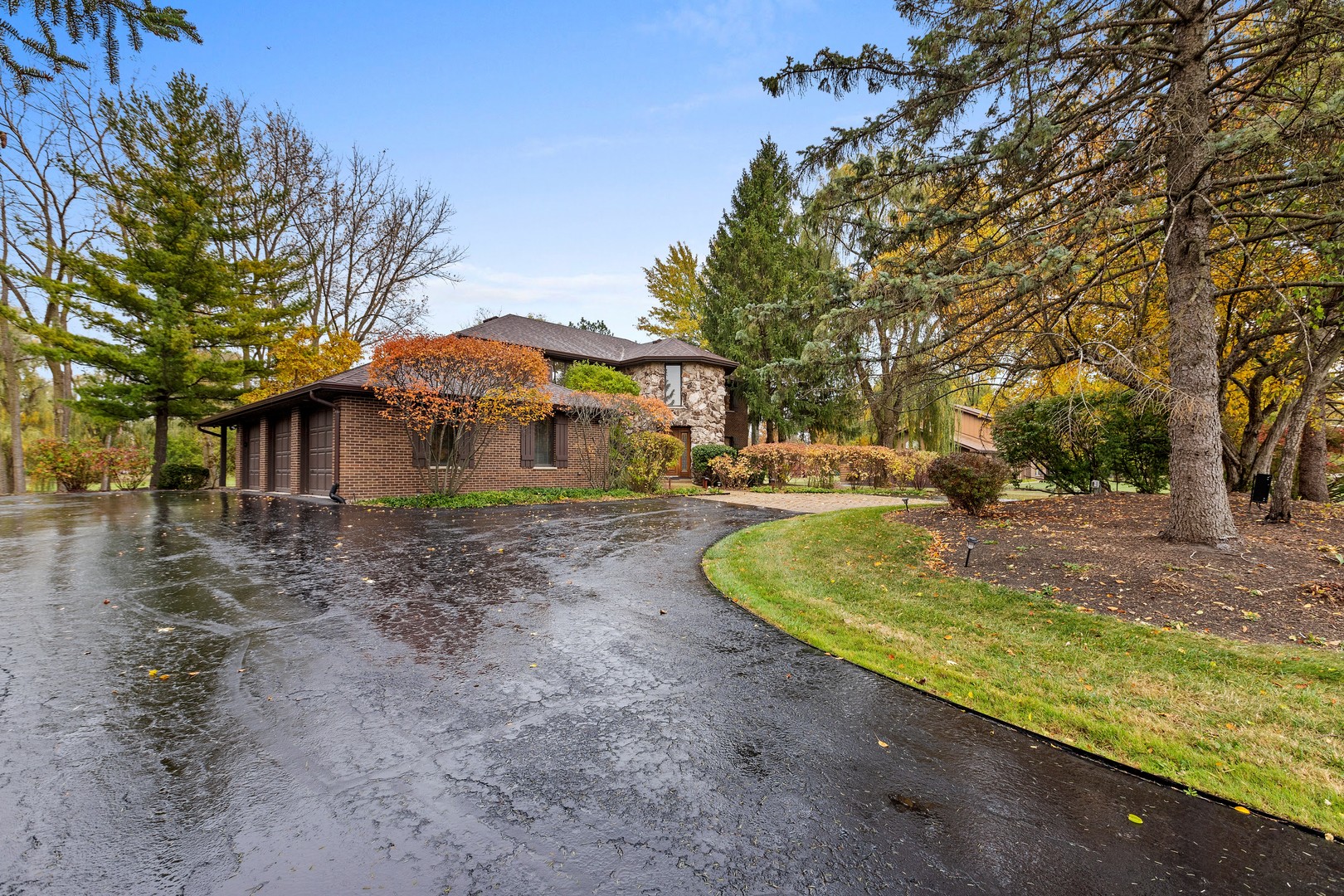 1051 Saunders Road Riverwoods, IL 60015 - Photo 33 of 37 a view of a house with pool and trees