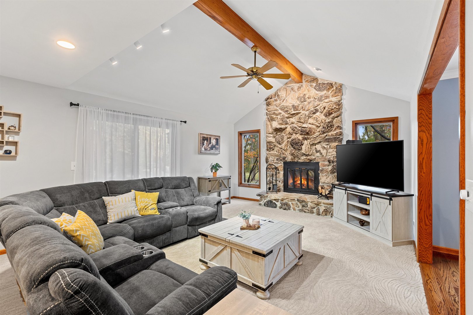 1051 Saunders Road Riverwoods, IL 60015 - Photo 10 of 37 a living room with furniture and a flat screen tv