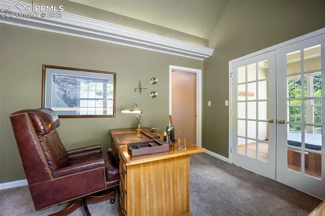 a view of a kitchen counter top space with wooden floor