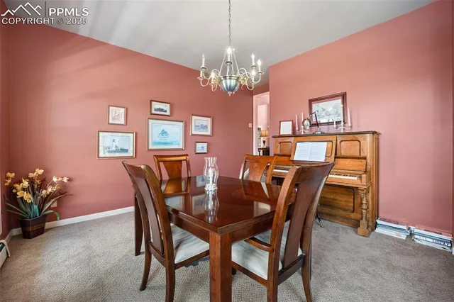 a view of a hallway with seating area