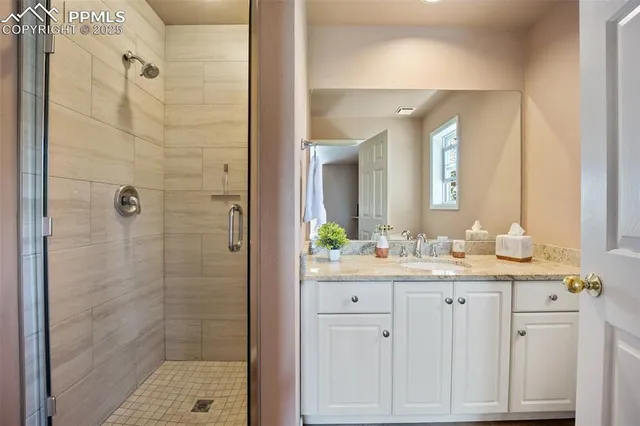 a bedroom with a bed and a closet