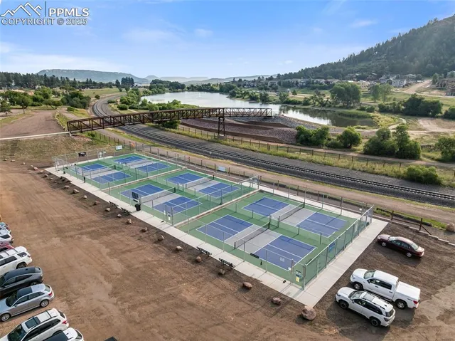 a view of swimming pool with an outdoor seating