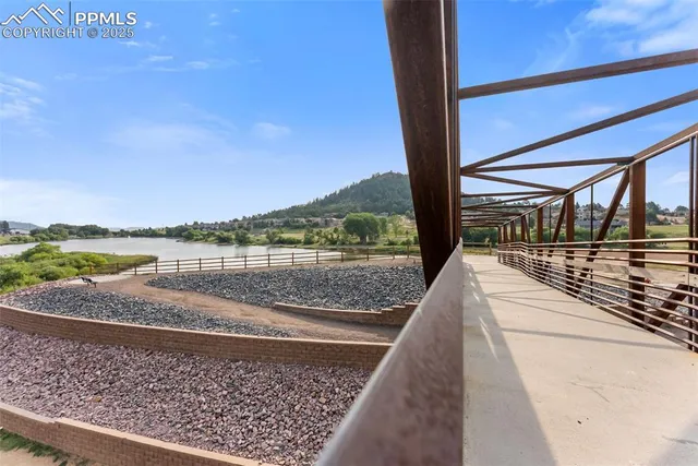a picture of a bathroom with a white wall