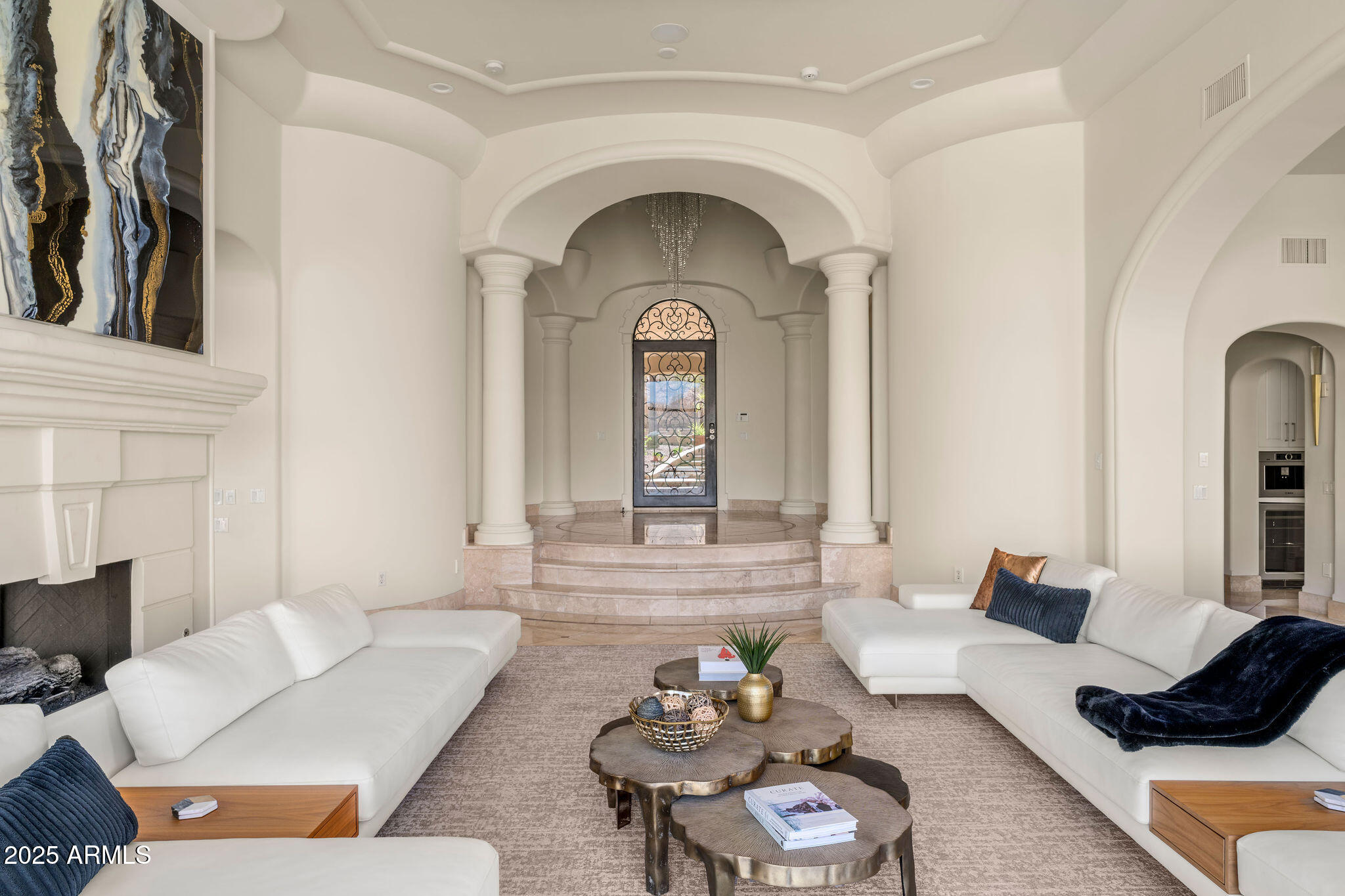 4490 East Valley Vista Lane Paradise Valley, AZ 85253 - Photo 14 of 45 a living room with furniture and a potted plant