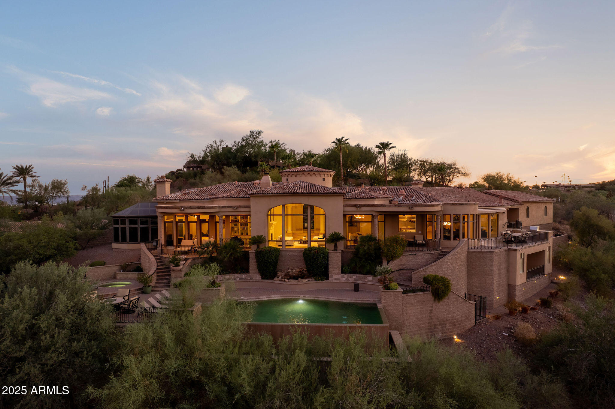 4490 East Valley Vista Lane Paradise Valley, AZ 85253 - Photo 2 of 45 a front view of a house with a yard