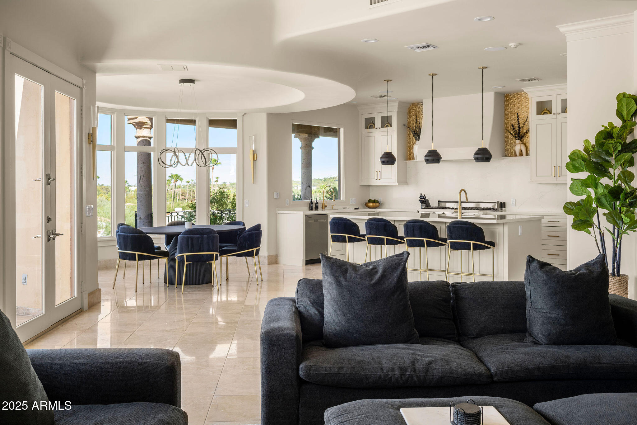 4490 East Valley Vista Lane Paradise Valley, AZ 85253 - Photo 21 of 45 a living room with furniture and a large window